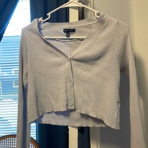 Light blue button up long-sleeve crop .